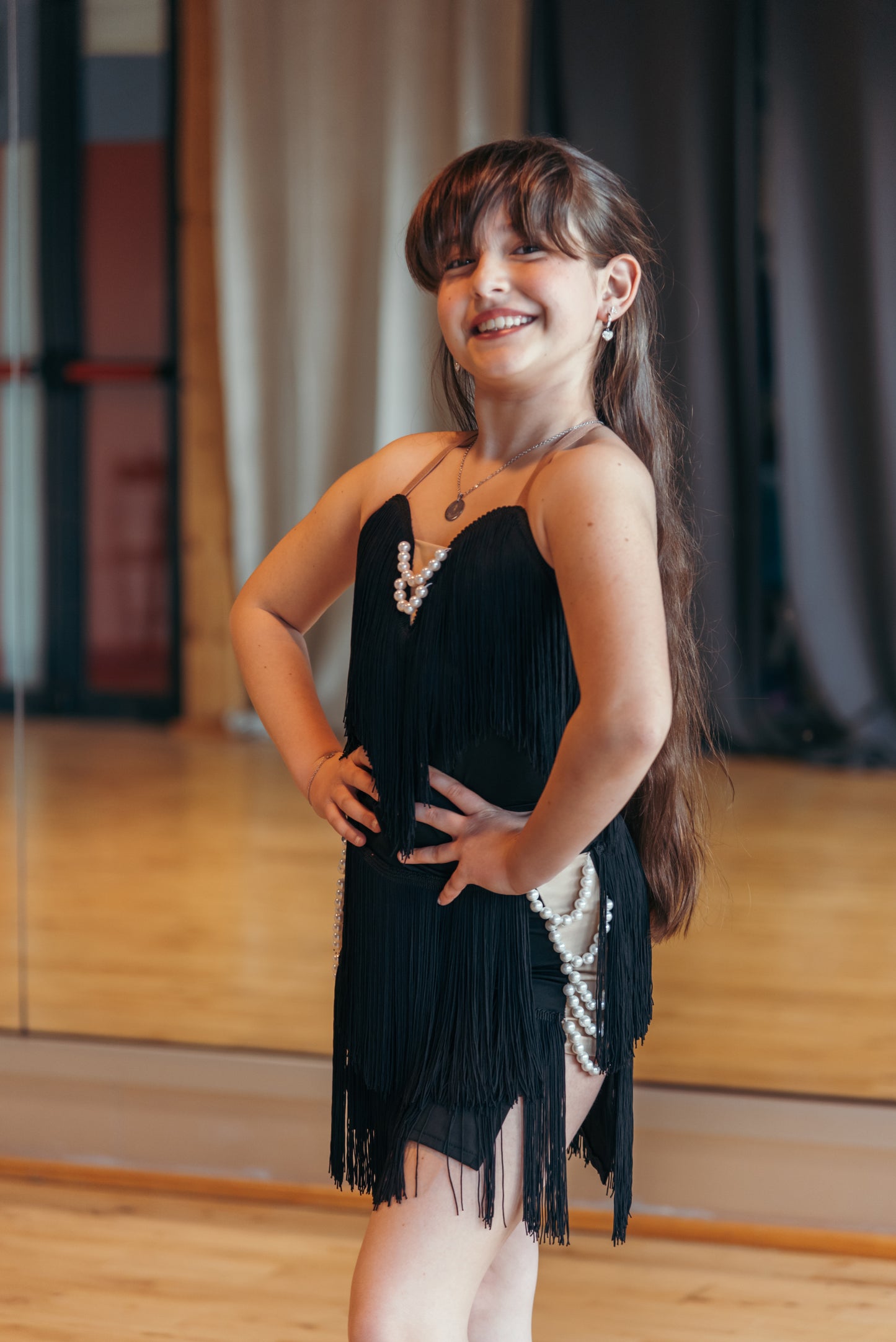 Body e gonna con frange e decorazione in perle